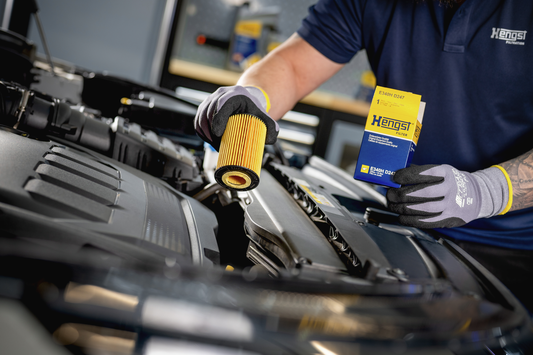 Audi VW Porsche engine oil filter by Hengst, model E813H01 D188, shown in a close-up image with a clean, professional appearance.