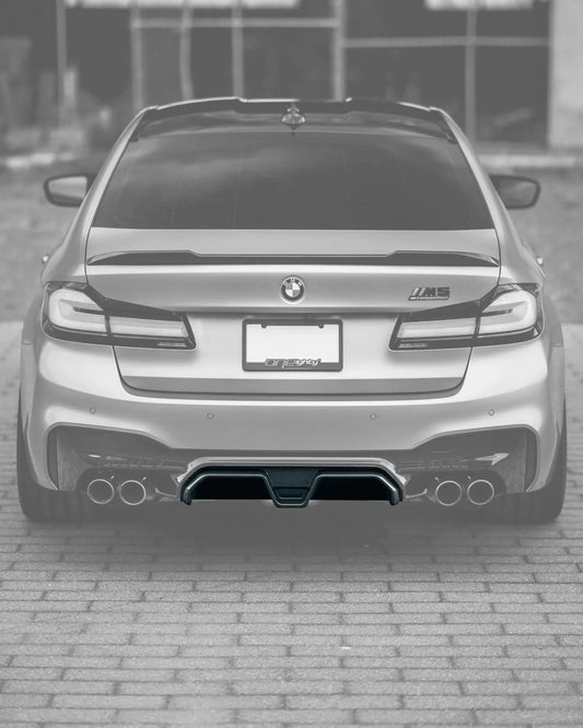 BMW 5 Series F90 M5 CS style carbon fiber rear diffuser by K2 Industries, showcasing sleek, aerodynamic design for 2020+ models.
