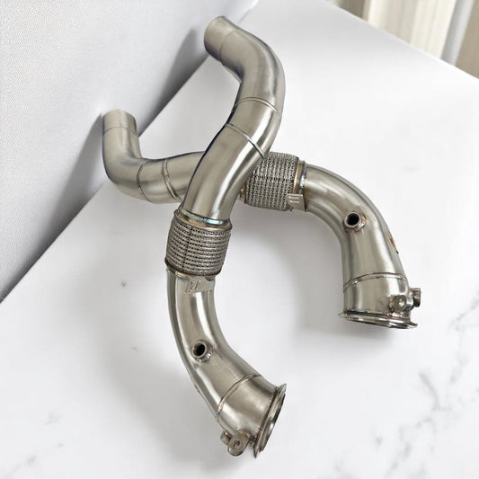 BMW N63R & N63B catless race downpipes for M550i, 750i, M850i, X5, X6, X7 by Palenon Performance, showing sleek metal design.