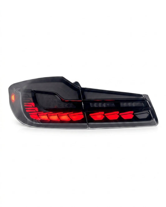 BMW 5-Series G30 G38 LED flow tail lights by K2 Industries, showing the sleek, modern design of the taillights from the rear angle.