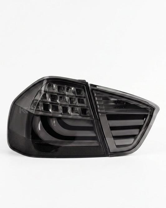 BMW 3-Series E90 tail light upgrade by K2 Industries, showing sleek red and clear tail lights for 2006-2009 models.