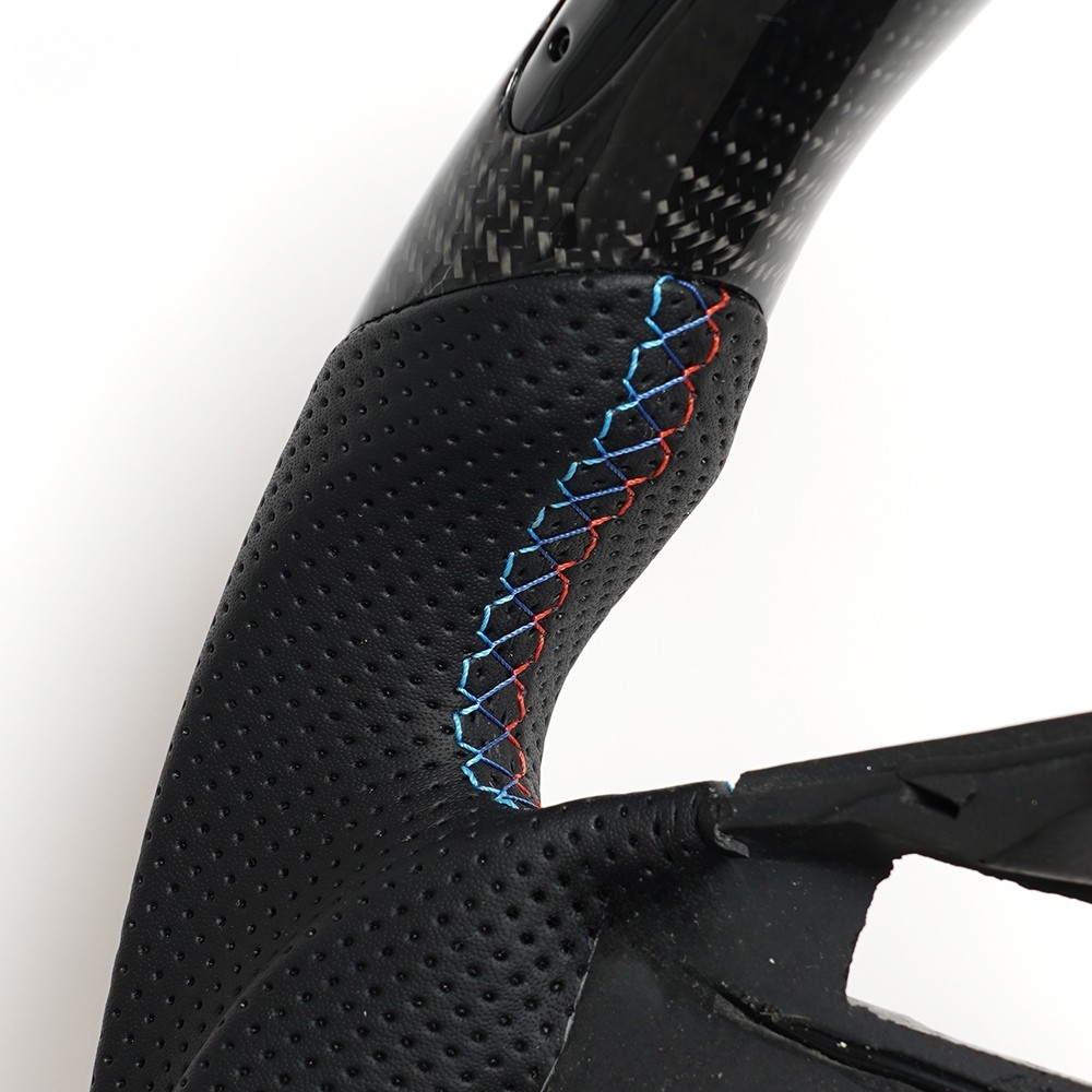 Vekto LED carbon fiber steering wheel with paddle shifter cutouts for BMW E90, E92, E93 M3, 328i, and 335i models.