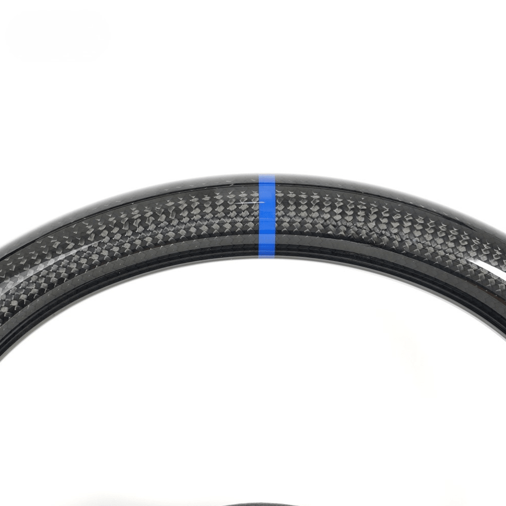 Vekto real carbon fiber steering wheel for Volkswagen Golf 7 MK7 GTI, close-up view of the sleek, textured carbon fiber surface.