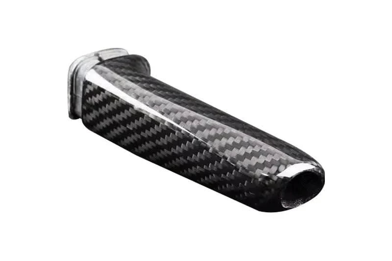 BMW carbon fiber handbrake lever cover by K2 Industries, showcasing a sleek, textured carbon fiber finish on the handbrake lever.