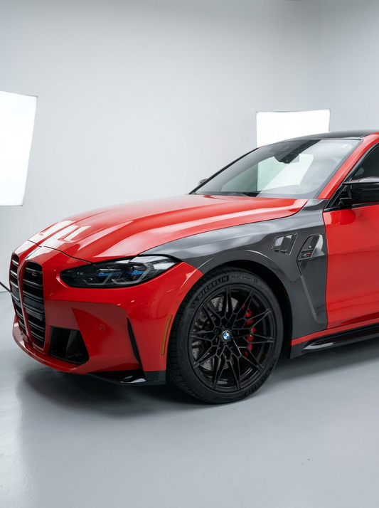 BMW 4 Series G82 M4 carbon fiber fenders by K2 Industries, showcasing lightweight, aerodynamic design on the car's front.