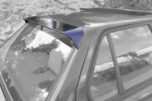 BMW E30 3 Series roof spoiler by K2 Industries, shown installed on the 1982-1994 coupe with sleek aerodynamic design.