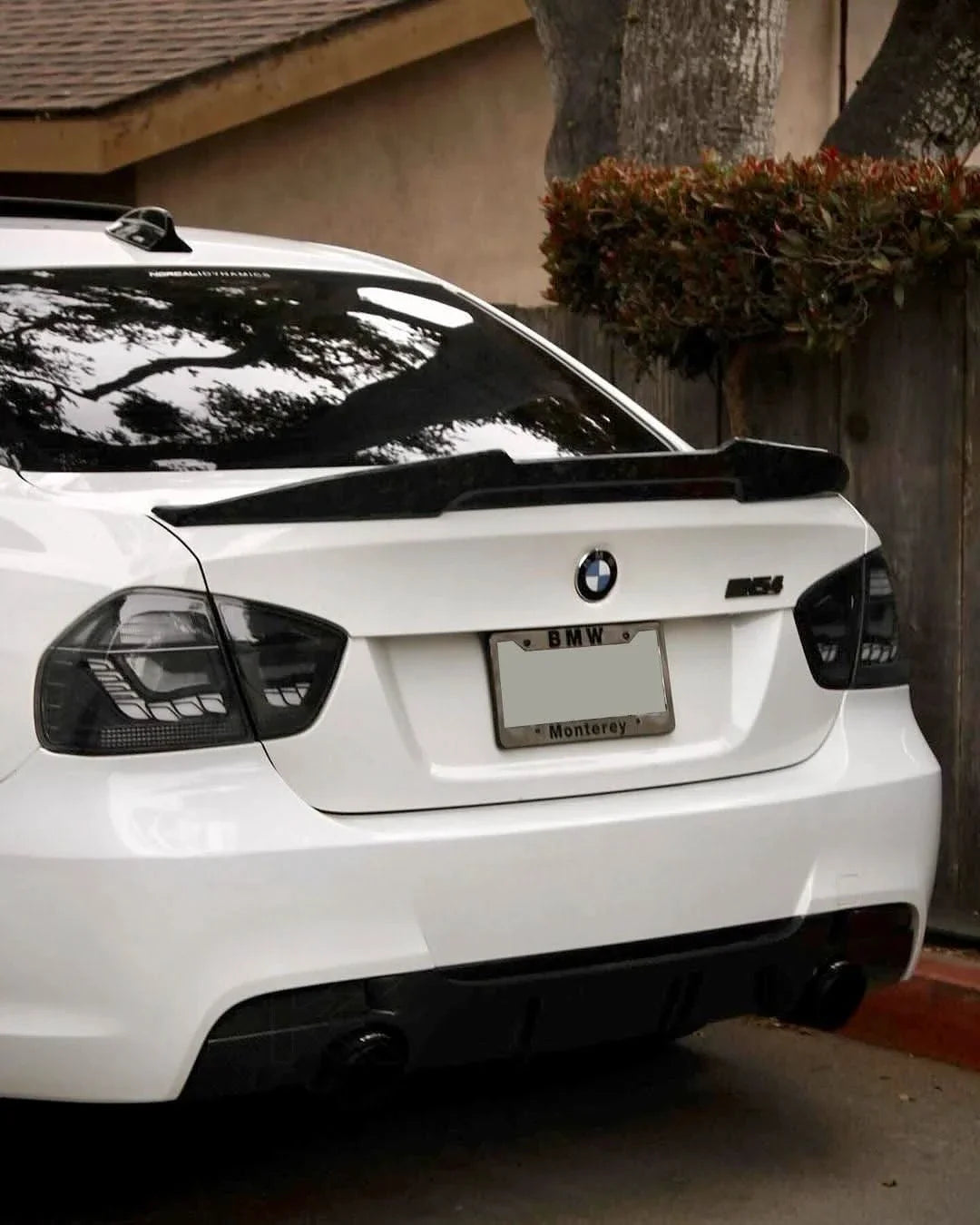 BMW 3 Series E90 M3 GTS OLED tail lights by K2 Industries, showing sleek, modern design with illuminated OLED sections.