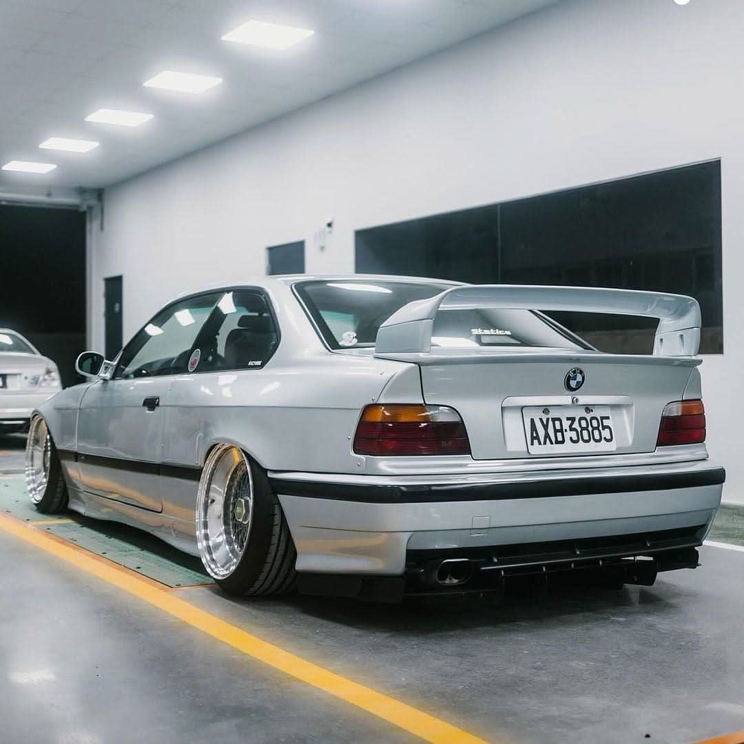 BMW E36 Precision Aluminum Diffuser V1 by K2 Industries, showing the sleek aluminum diffuser with detailed vents and mounting points.