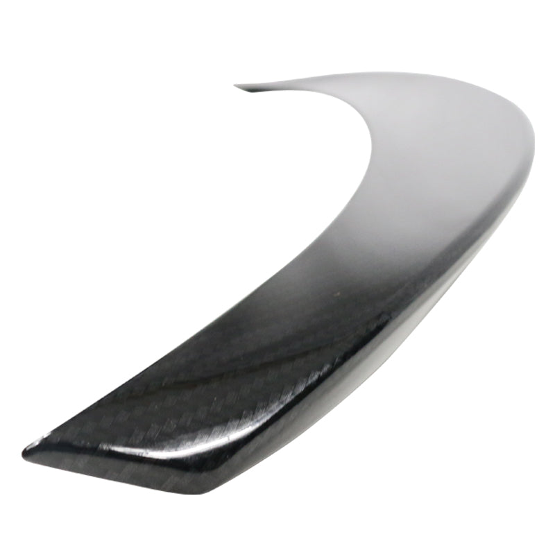 BMW F32 4 Series trunk spoiler in carbon fiber print by K2 Industries, showcasing sleek P-style design on a black car.