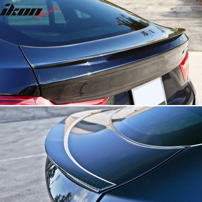 BMW F26 X4 trunk spoiler with carbon fiber print by K2 Industries, showcasing sleek aerodynamic design and textured finish.