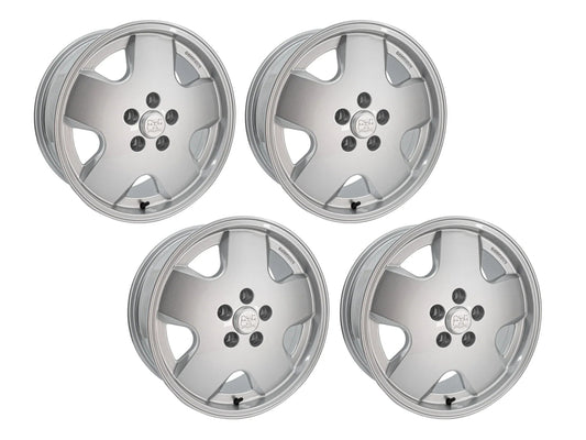 Set of OEM replica alloy wheels for Bus and Vanagon by GoWesty, available in 15, 16, and 17-inch sizes with matching tires and accessories.