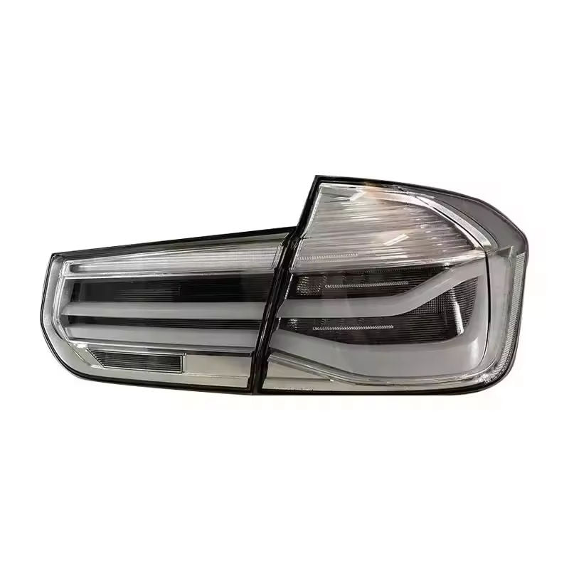 Vekto MP Style clear LED tail lights for BMW 3 Series F30/F35 2012-2018, showing sleek taillight design on a vehicle.