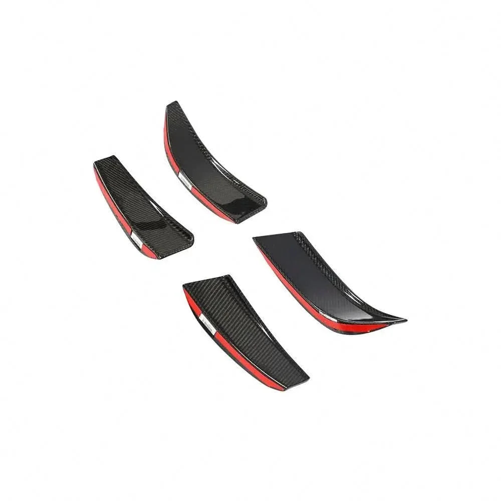 Carbon fiber front splitter with canards and fins for BMW G80 M3, G82 G83 M4, designed for improved aerodynamics and style.