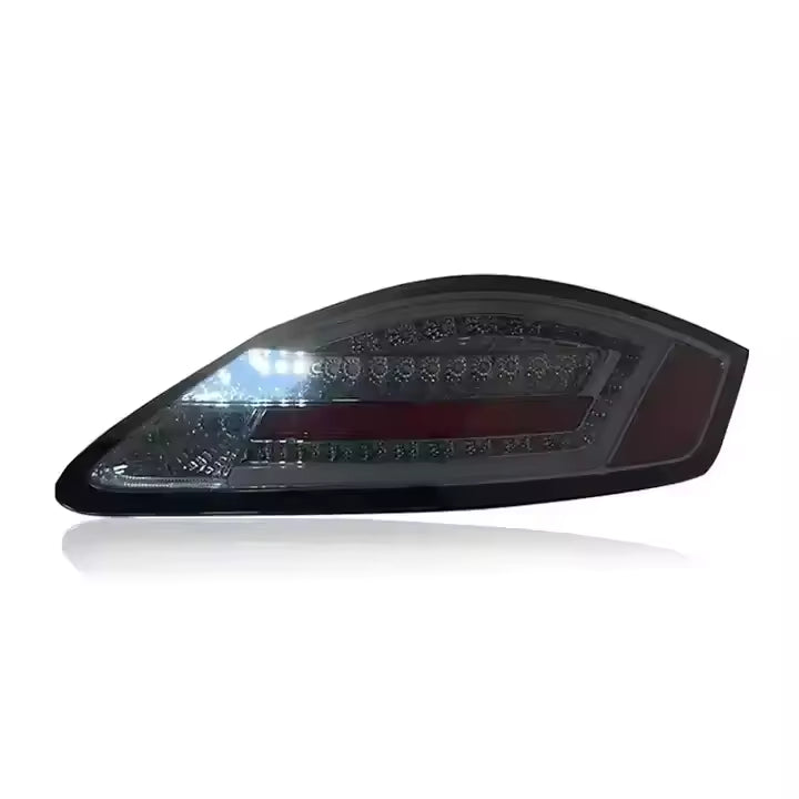 Vekto LED tail lights for Porsche Cayman and Boxster 987.1 2004-2008, showcasing sleek red and clear taillight design.