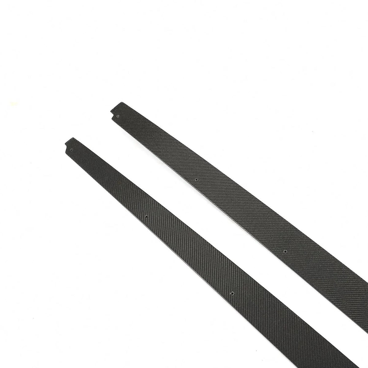 Carbon fiber side skirts for BMW F10 M5 and M Sport, K2 Industries performance side extensions on the vehicle's side.