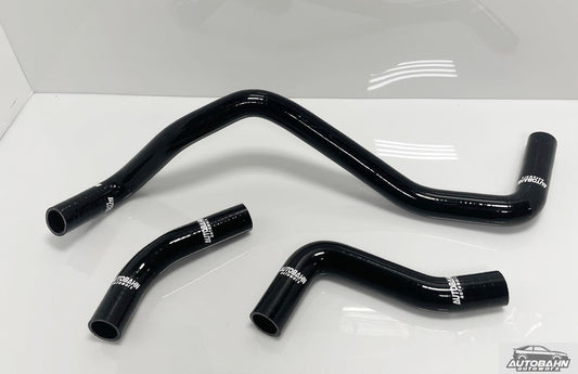 Autobahn Autoworx VW MK4 Golf Jetta Beetle coolant hose kit with three black rubber hoses laid out on a surface.