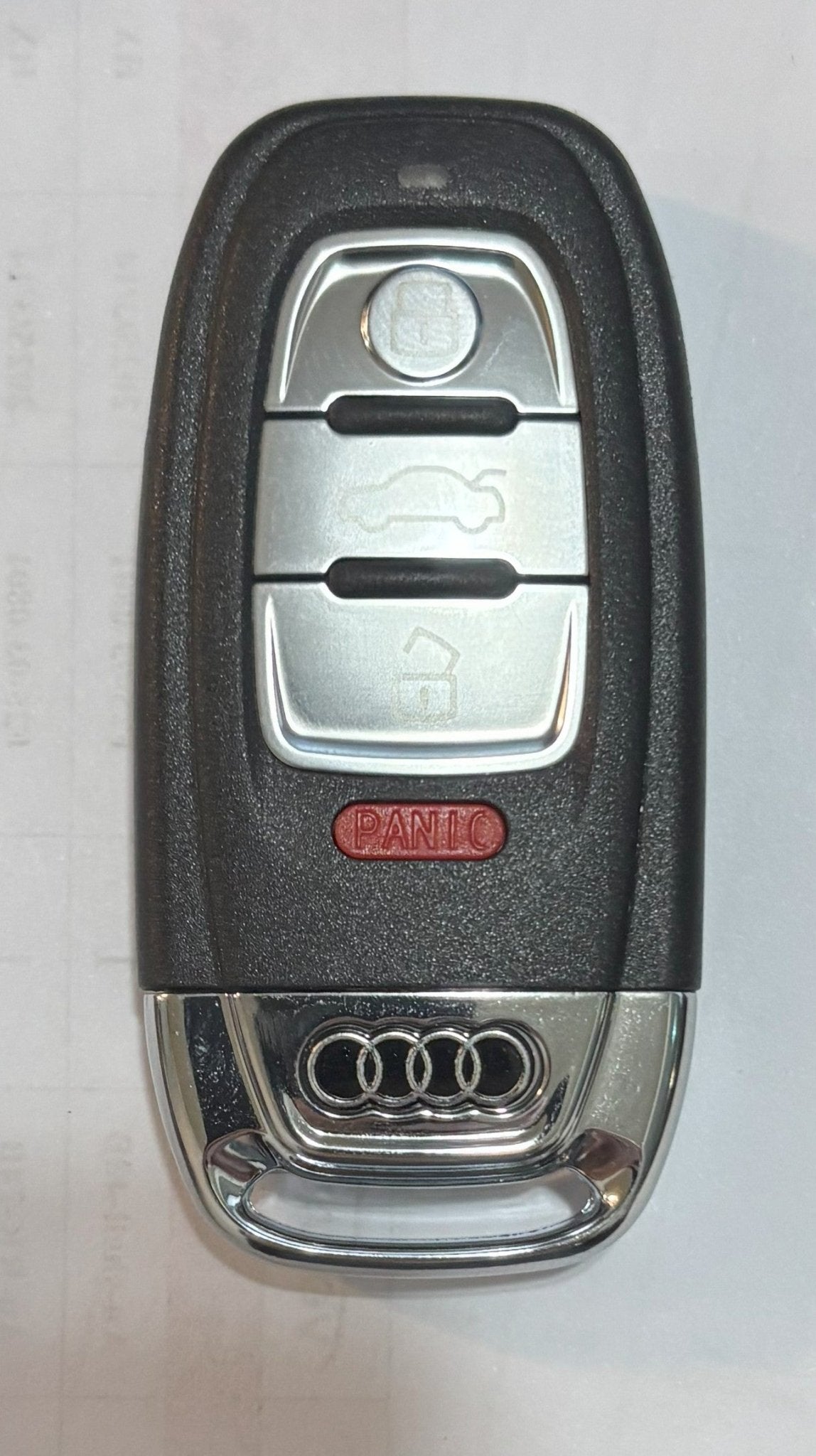 Audi remote control with OEM replacement design, featuring Audi rings logo, manufactured by Shenzhen Voraus Technology Co. LTD.