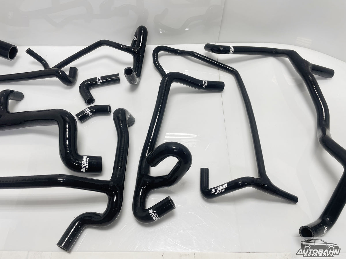 Autobahn Autoworx VW T4 Transporter Eurovan 24V VR6 coolant hose kit with multiple black rubber hoses, engine components visible.
