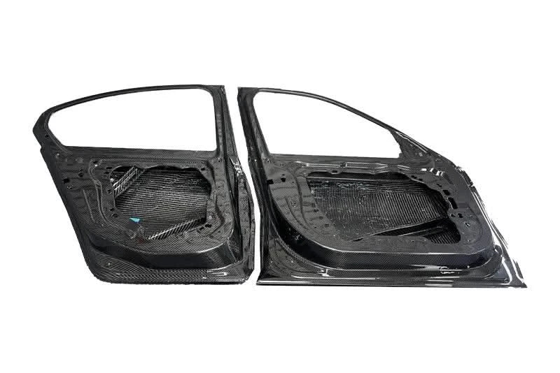 BMW 3 Series G20 G80 M3 carbon fiber doors by K2 Industries, showcasing sleek, lightweight carbon fiber door panels for 2019+ models.