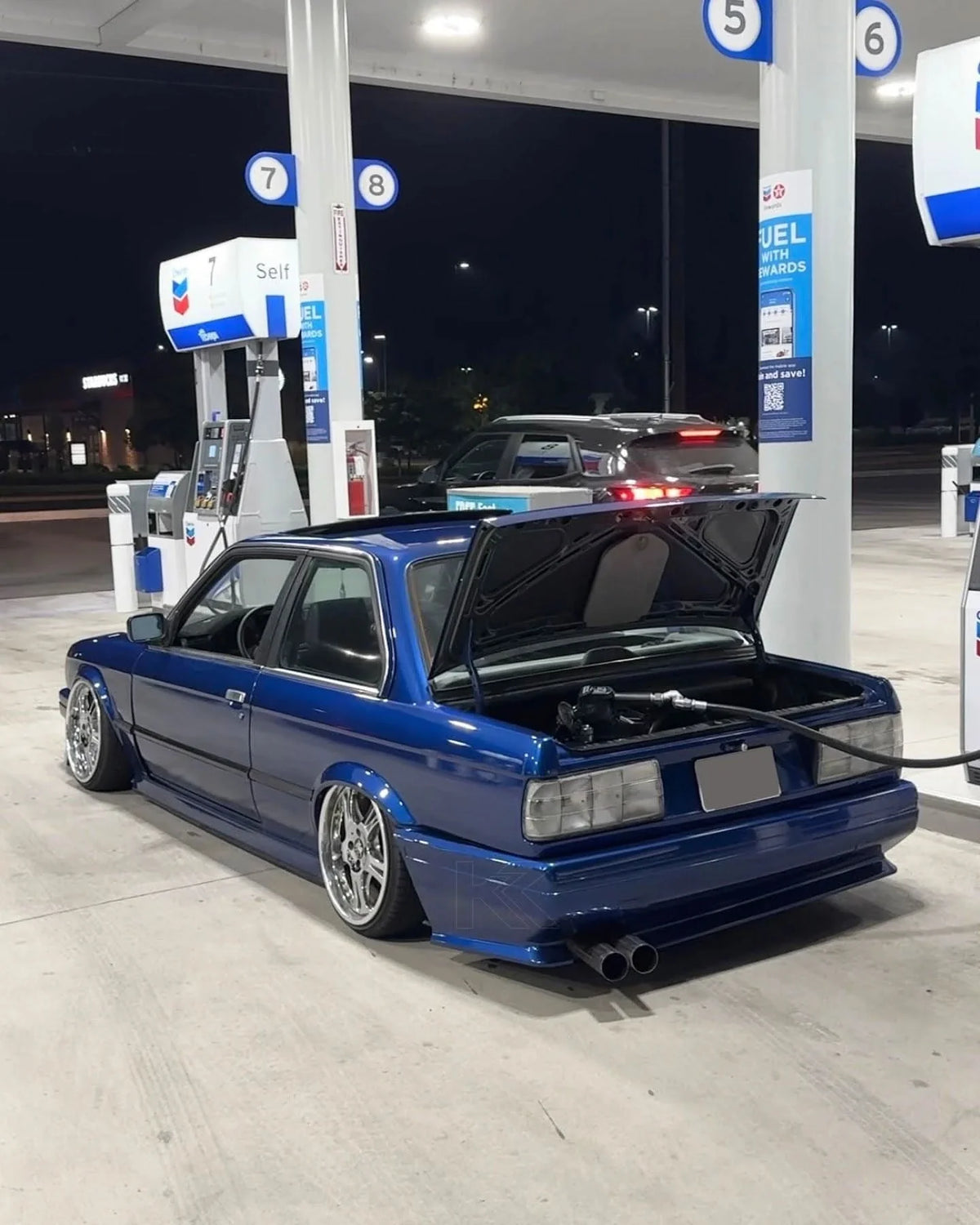 BMW 3 Series E30 facelift clear tail lights by K2 Industries, showing the sleek, transparent design for model years 1987-1994.