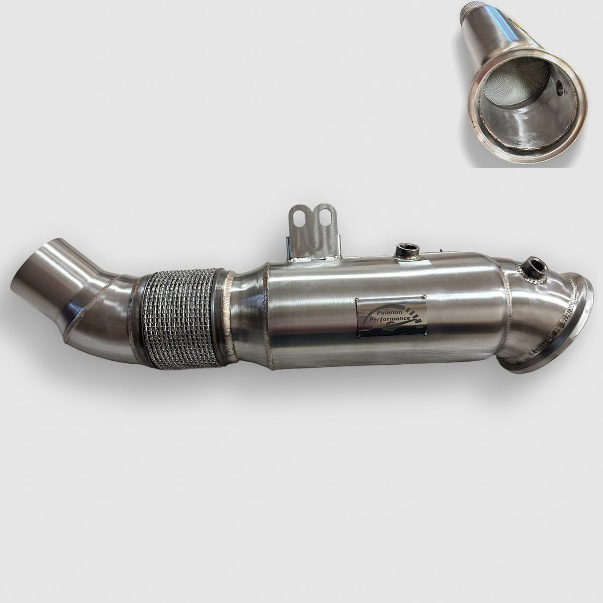 Palenon Performance 5 Inch B58 Downpipe for BMW and Toyota Supra, showing shiny metal exhaust pipe with flanges and welds.