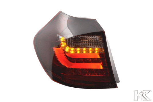 BMW 1 Series E87/E81 3/5-door red smoked LED tail lights by K2 Industries, for models 2007-2011, showcasing sleek taillight design.