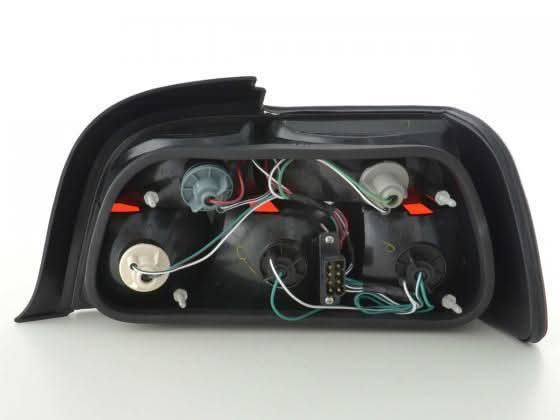 BMW 3 Series E36 Coupe JDM style tail lights by K2 Industries, showing sleek red and clear lens design for model years 1991-1998.