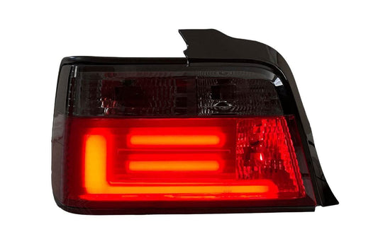 BMW 3 Series E36 sedan tail lights with red and smoke LED bar, aftermarket JDM style, manufactured by K2 Industries.