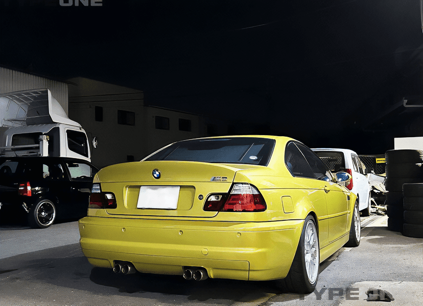 BMW 3-series E46 Coupe red LED taillights set by K2 Industries, rear view showing bright LED lightbar and tail light design.