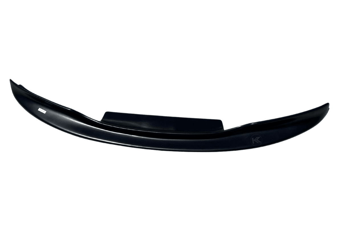 BMW 3-Series E46 M3 CSL front lip spoiler by K2 Industries, made of ABS, fits 1999-2005 E46 M3 models, shown in black.