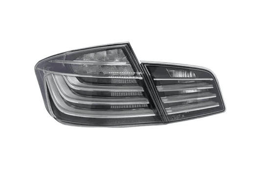 BMW 5-Series F10 clear style LED tail lights by K2 Industries, showing sleek, transparent lens design for 2010-2017 models.