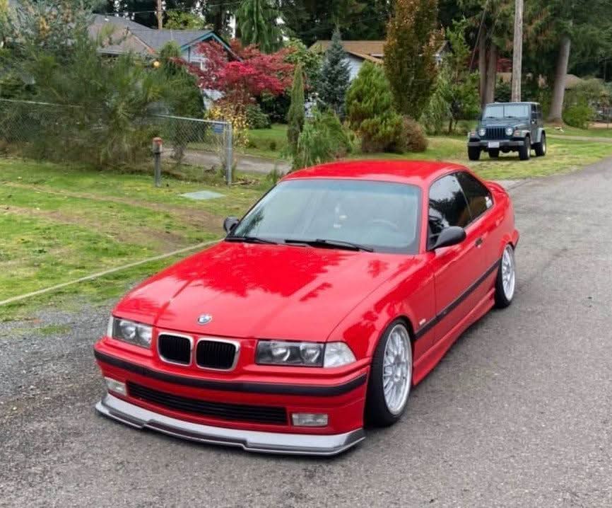 BMW E36 Rieger Front Lip in carbon style by K2 Industries, non-M model, installed on 1990 BMW E36 coupe, front view.