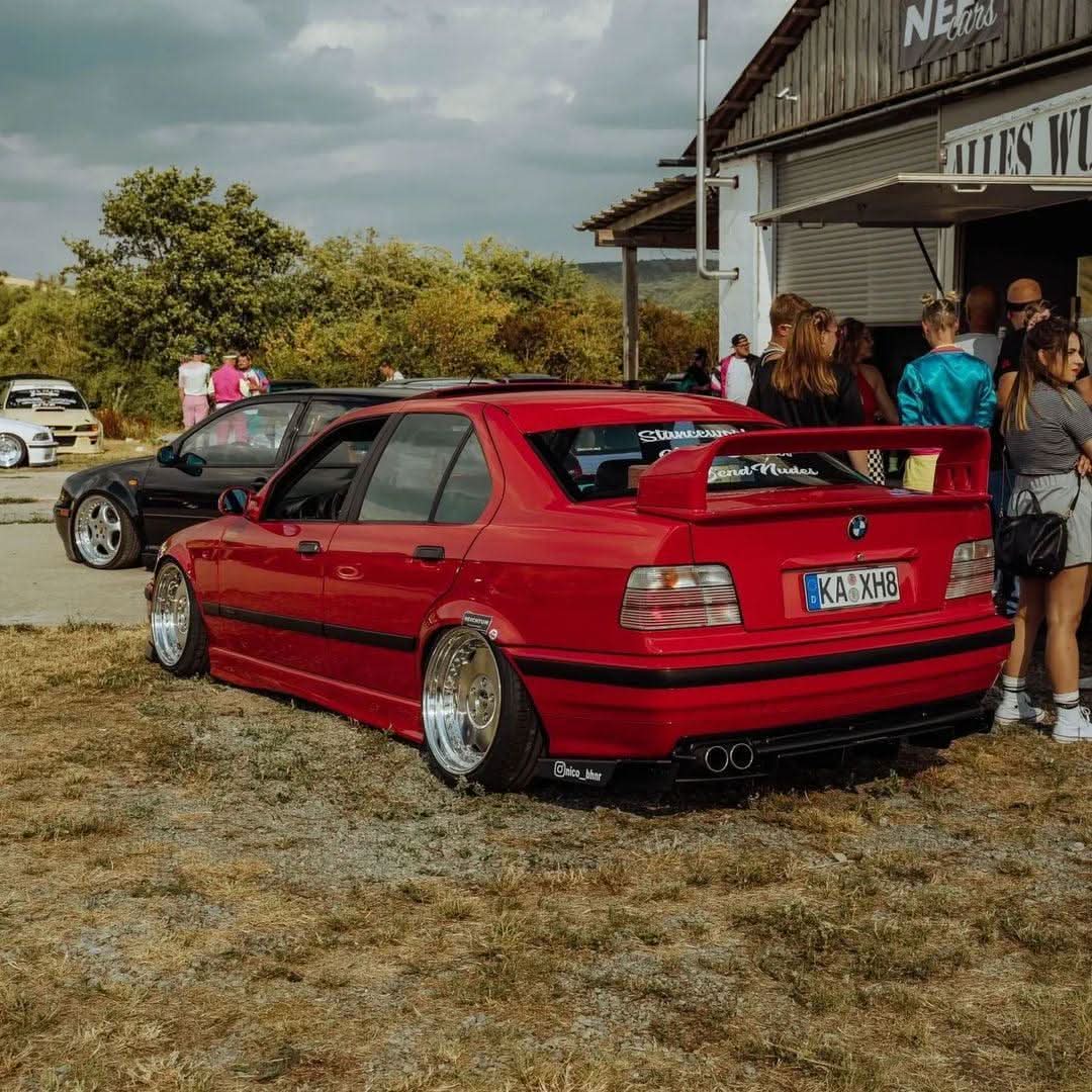 BMW E36 Sedan clear OEM style tail lights by K2 Industries, showing the sleek, transparent design for 1990-1999 models.