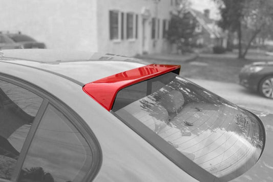 Black BMW E46 Sedan Series 3 HM roof spoiler by K2 Industries, mounted on the car's rear roof for aerodynamic style.