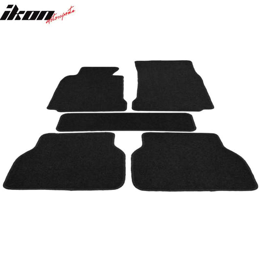 Black carpet car floor mats for BMW E39 5 Series 1997-2003, 5-piece set by K2 Industries with nylon material, on a vehicle floor.