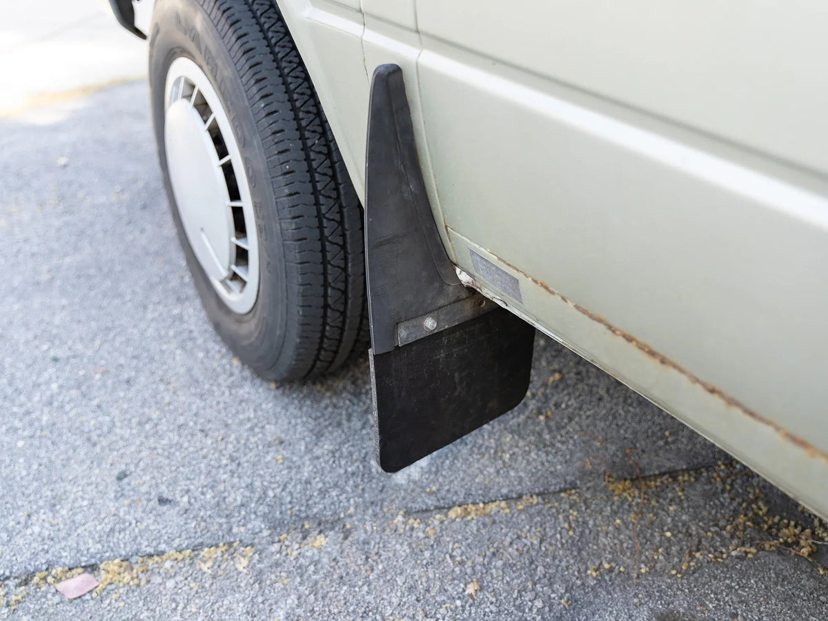 GoWesty Vanagon mud flap repair kit with replacement parts and tools for easy installation and maintenance.
