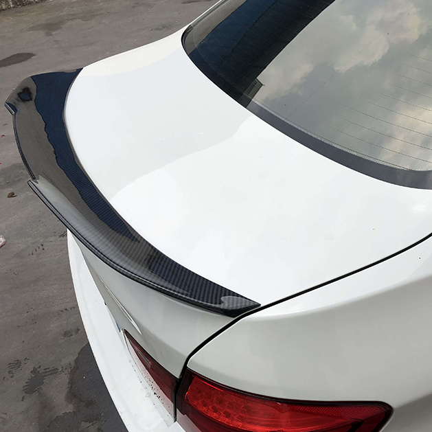 BMW E90 PSM trunk spoiler in carbon fiber, designed for 325i, 328i, and 335i models, by Palenon Performance.