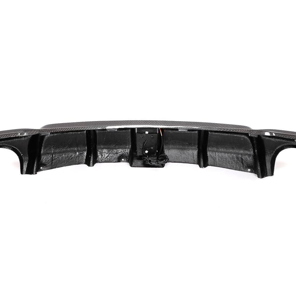 Carbon fiber F30 rear diffuser with brake light for BMW 3 Series F30/F31 2013-2018, featuring sporty design and M Sport style.