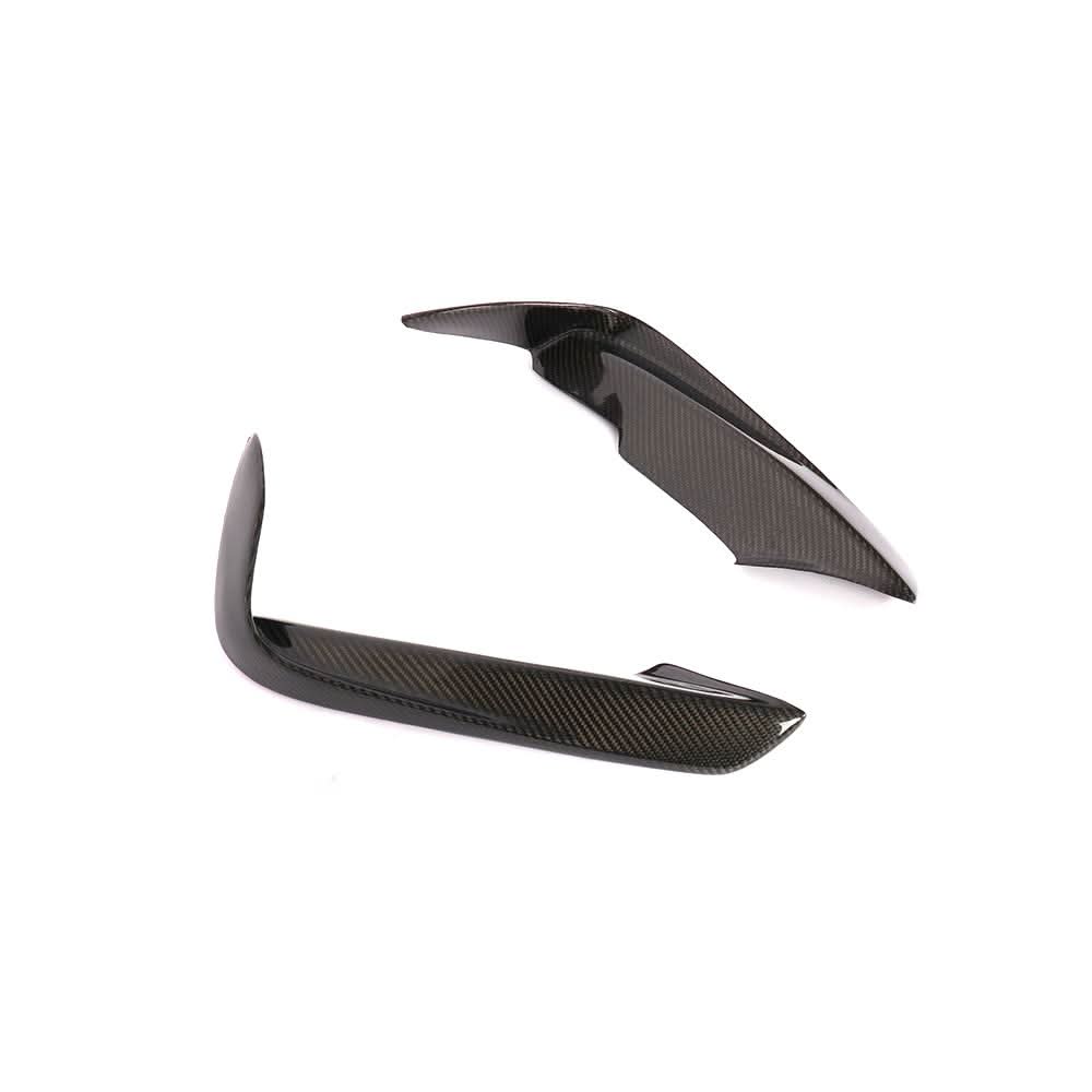 Carbon fiber front bumper canards for BMW F30, F31, F35 M Sport models, designed to enhance aerodynamics and style.