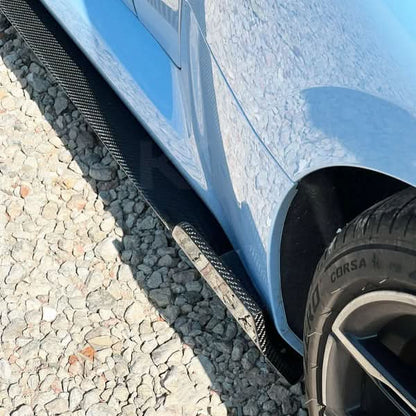 BMW 2 Series G87 M2 carbon fiber A-style side skirts by K2 Industries, showcasing sleek, aerodynamic design for 2023+ model.