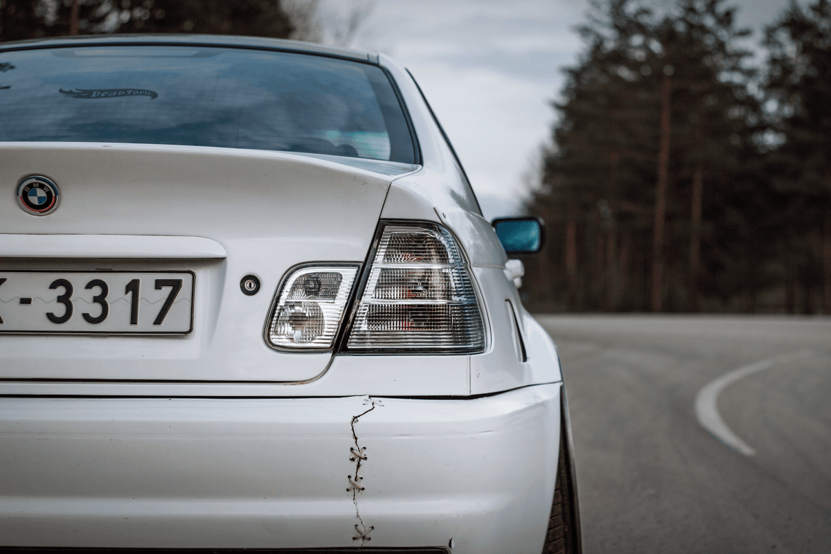 BMW 3-Series E46 sedan clear tail lights by K2 Industries, showing the sleek, transparent design for model years 1998-2006.