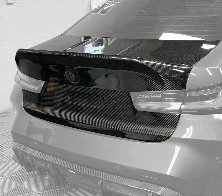 BMW 3 Series G80 M3 CSL style carbon fiber trunk by K2 Industries, showcasing lightweight, aerodynamic design for 2019+ models.