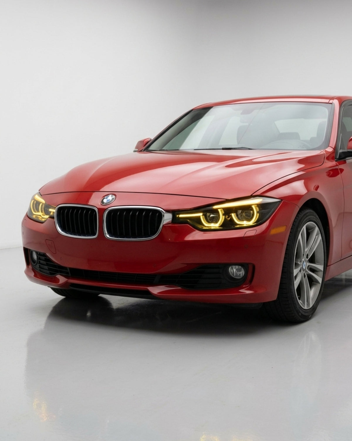 BMW 3 Series F30/F31/F35 V3 smoked triple-color LED headlight assembly with white, yellow, and red daytime running lights.