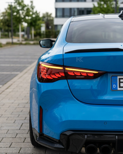 BMW 4-Series G22 G23 G82 M4 GTS OLED style LED taillight by K2 Industries, showcasing sleek design and bright lighting elements.