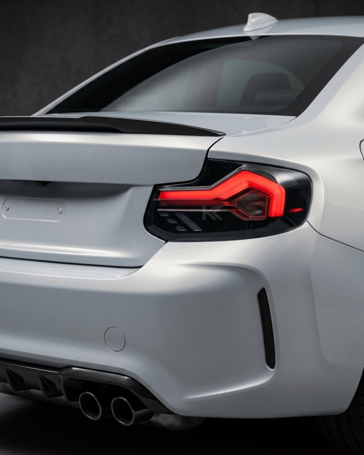 BMW 2-Series F22 F23 M2 F87 220i 225i F44 smoked LED tail lights by K2 Industries installed on the vehicle.