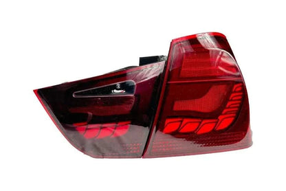 BMW 3 Series E90 M3 GTS OLED tail lights by K2 Industries, showing sleek red and clear lens design for model years 2006-2011.