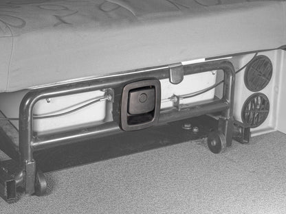 GoWesty rear bench seat latch installed in Eurovan Winnebago, showing the seat part attached inside the vehicle.