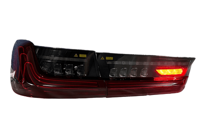 BMW 3 Series G20 G28 tail lights in red and smoked CSL style with laser detailing, installed on a 2019-2024 model.