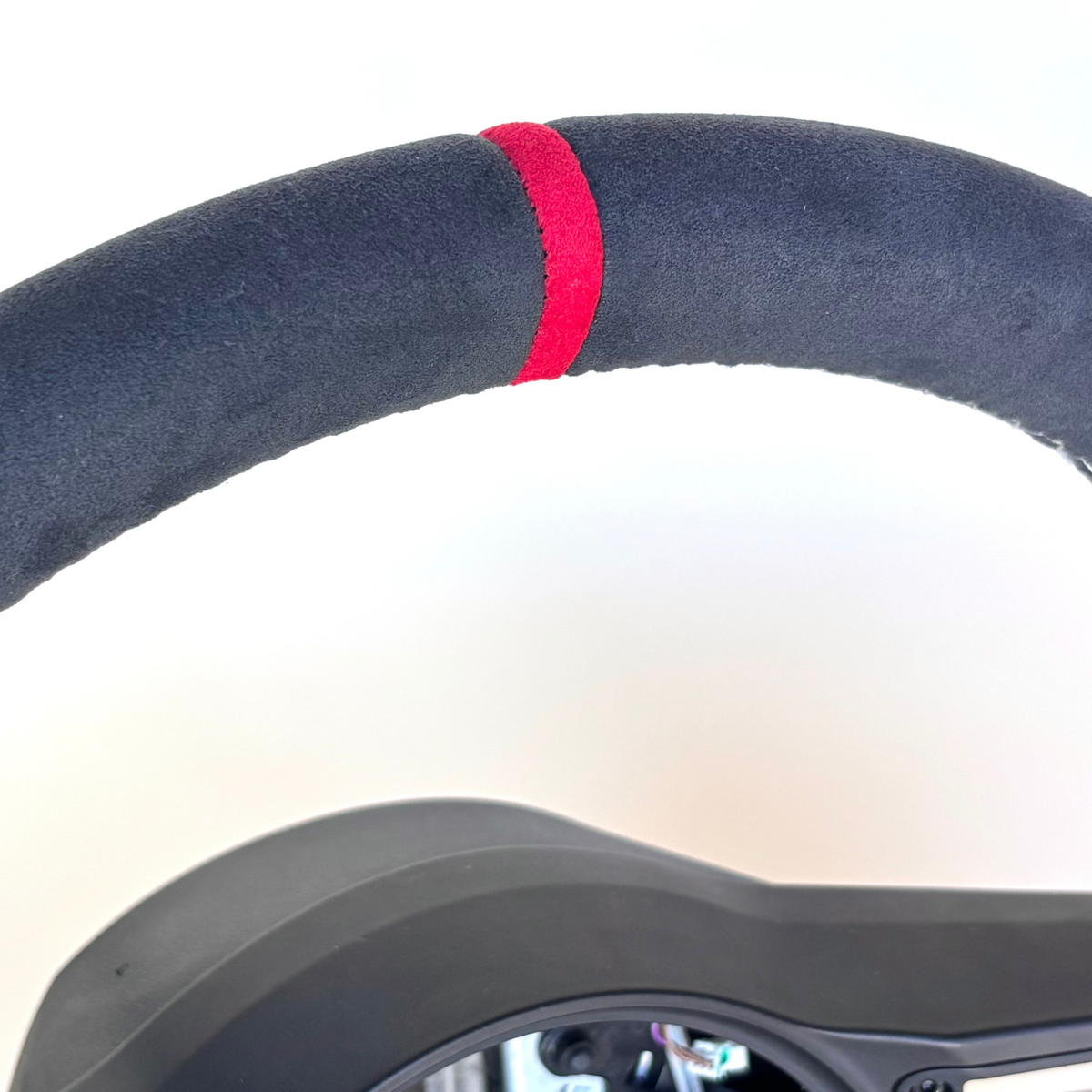 Red manual Porsche 991.2 steering wheel interior trim by Boston Motortech, featuring sporty red leather and detailed stitching.