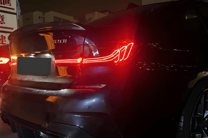 BMW 3 Series G20 G28 tail lights with red and smoked CSL style laser design by K2 Industries, showing the sleek light pattern.